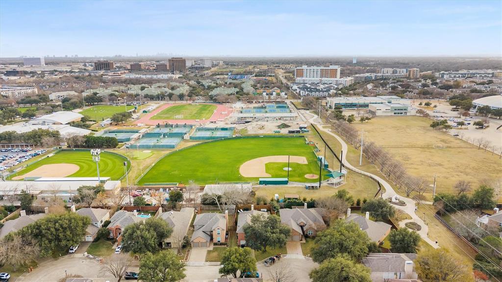 4008 Sherry Lane Addison, TX 75001 - Photo 31 of 39 an aerial view of a resort with swimming pool and ocean view