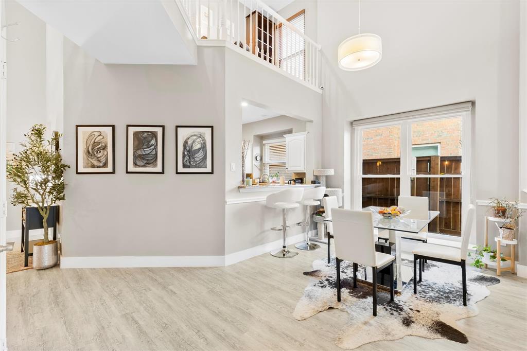 4008 Sherry Lane Addison, TX 75001 - Photo 7 of 39 a workspace with furniture window and wooden floor