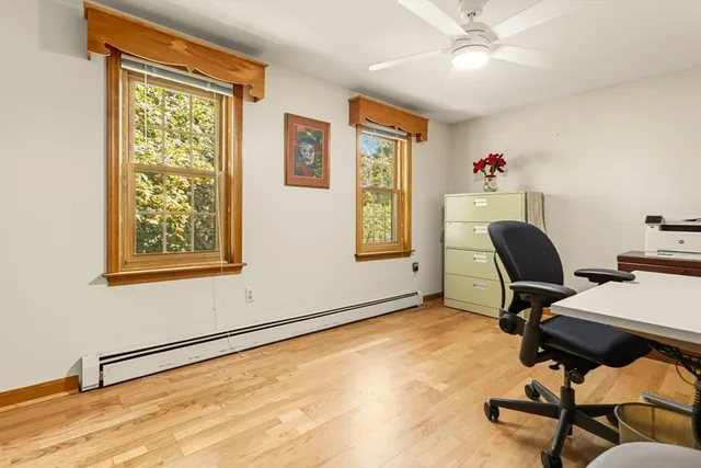 a view of a patio with table and chairs and potted plants