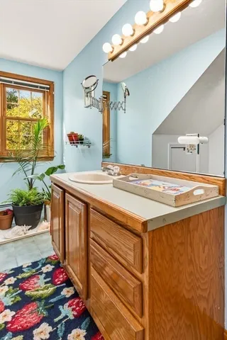 a backyard of a house with barbeque oven