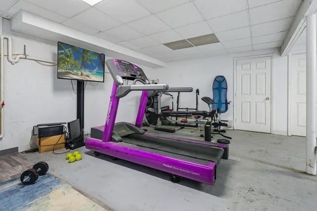 a aerial view of a house with swimming pool and garden