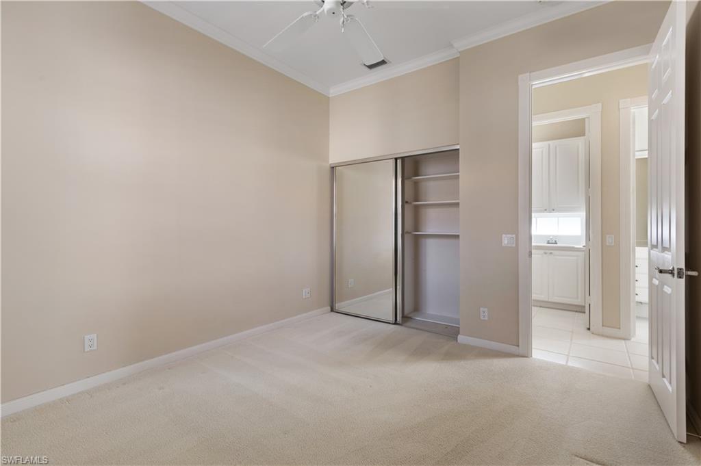 3888 Valentia Way Naples, FL 34119 - Photo 23 of 48 a view of an empty room