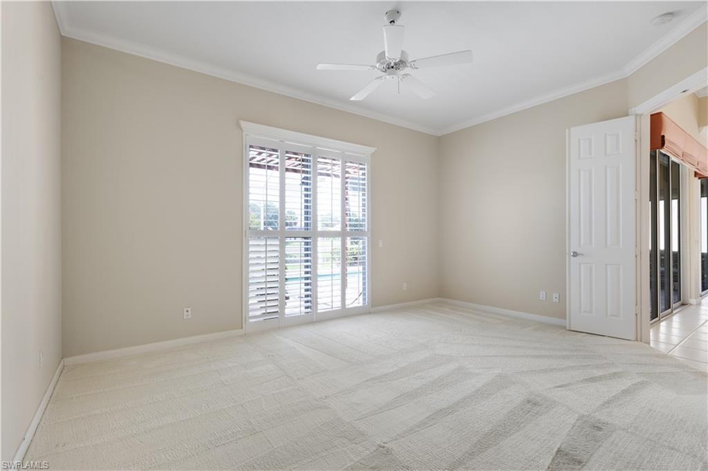 3888 Valentia Way Naples, FL 34119 - Photo 24 of 48 a view of an empty room with a window