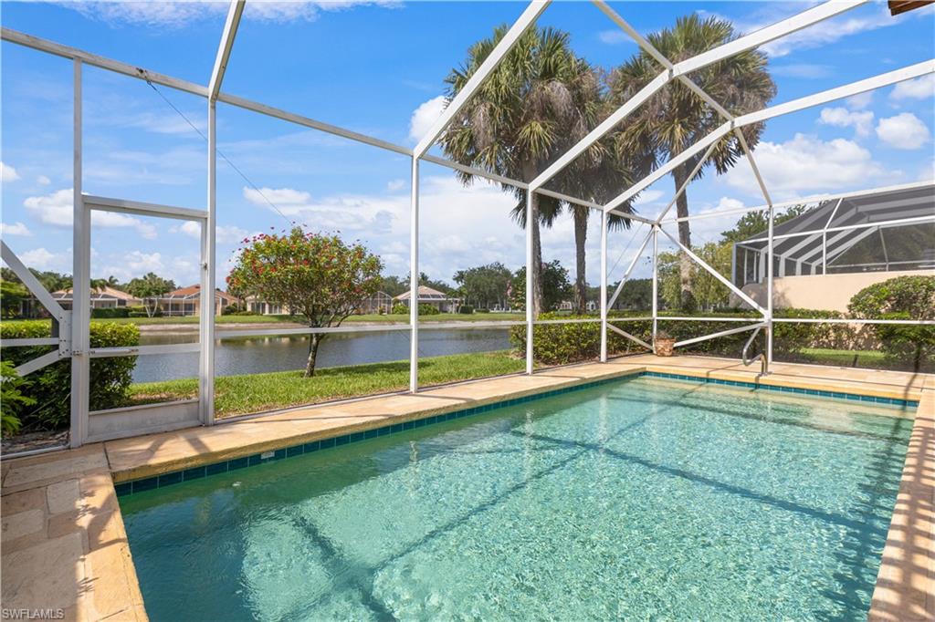 3888 Valentia Way Naples, FL 34119 - Photo 39 of 48 a view of a backyard with swimming pool