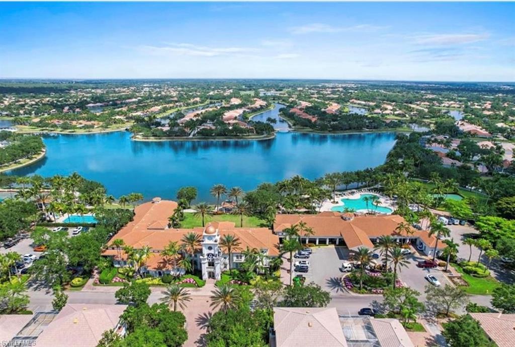 3888 Valentia Way Naples, FL 34119 - Photo 43 of 48 an aerial view of ocean and residential houses with outdoor space and lake view