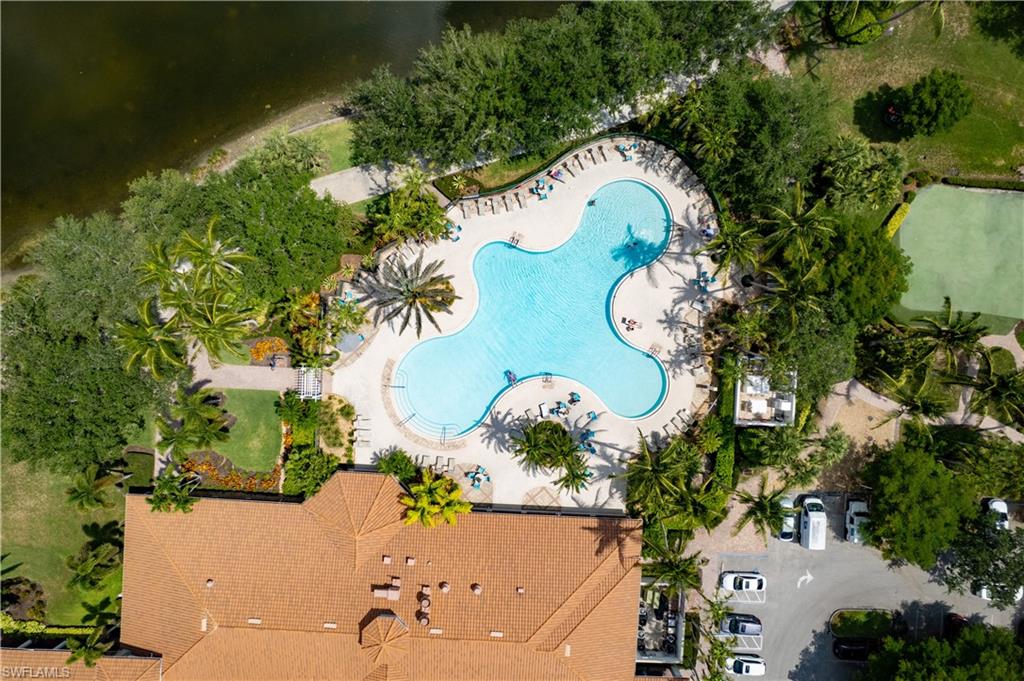 3888 Valentia Way Naples, FL 34119 - Photo 46 of 48 an aerial view of a swimming pool
