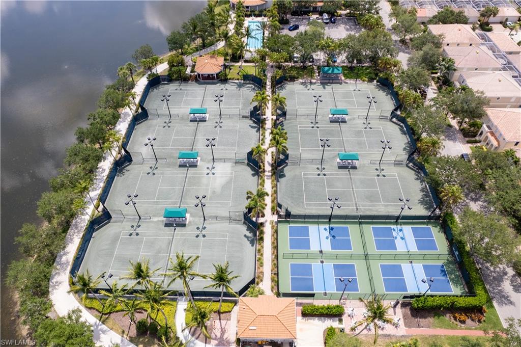 3888 Valentia Way Naples, FL 34119 - Photo 47 of 48 an aerial view of residential houses with outdoor space