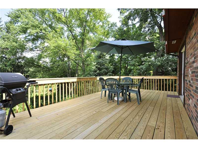 2745 Cole Road Wexford, PA 15090 - Photo 10 of 20 Patio/Deck. Deck extends across the back of the house opening from the LR/GR or Kitchen.New deck, with the exception of the steps, was redone in 2013. Very private.