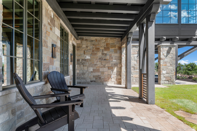 2192 East Outlaw Road Kamas, UT 84036 - Photo 64 of 80 Stone exterior with grid-patterned windows and exterior lighting