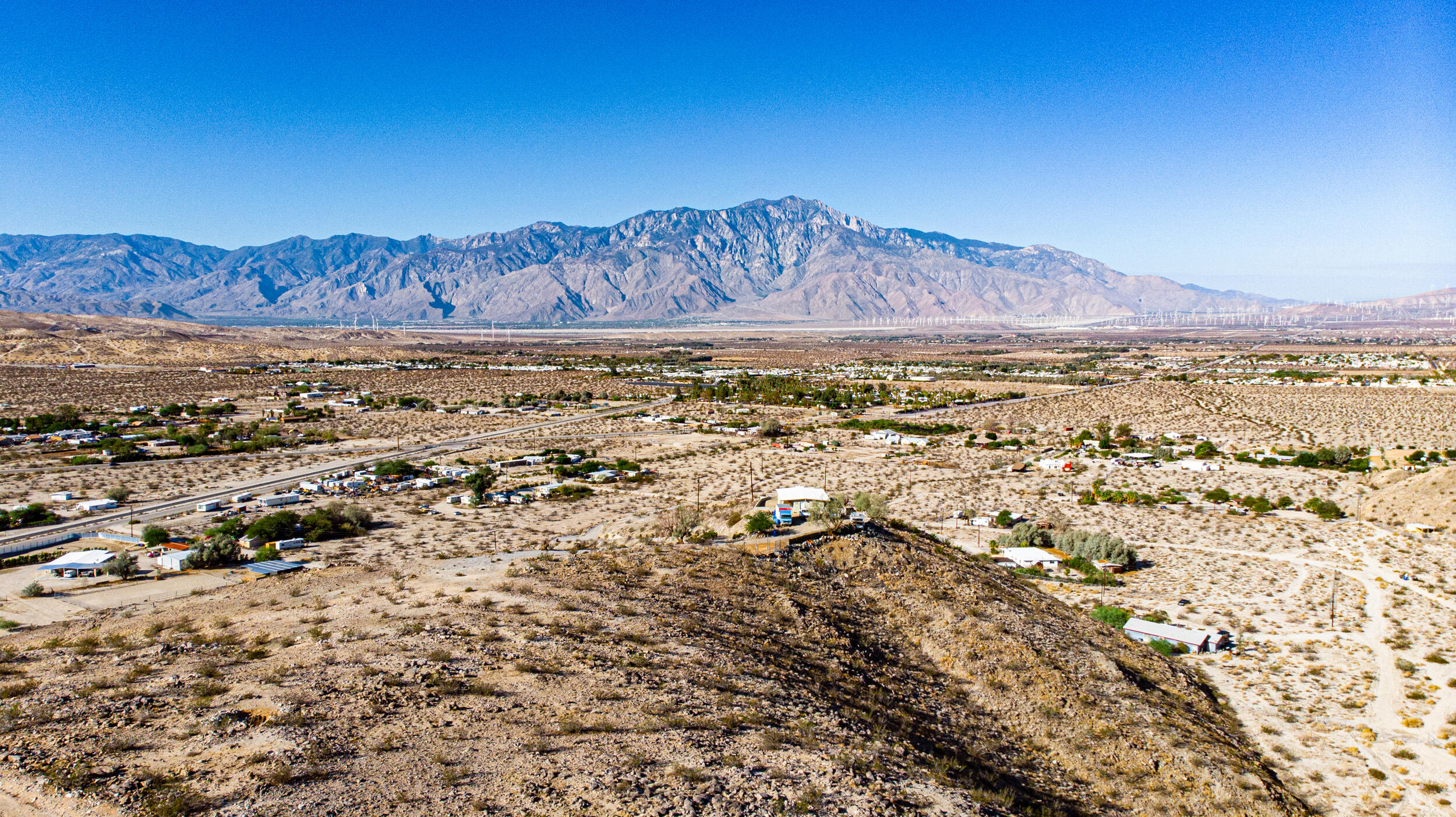 71690 Channel Run Road Desert Hot Springs, CA 92241 - Photo 12 of 18 a view of a city with mountain