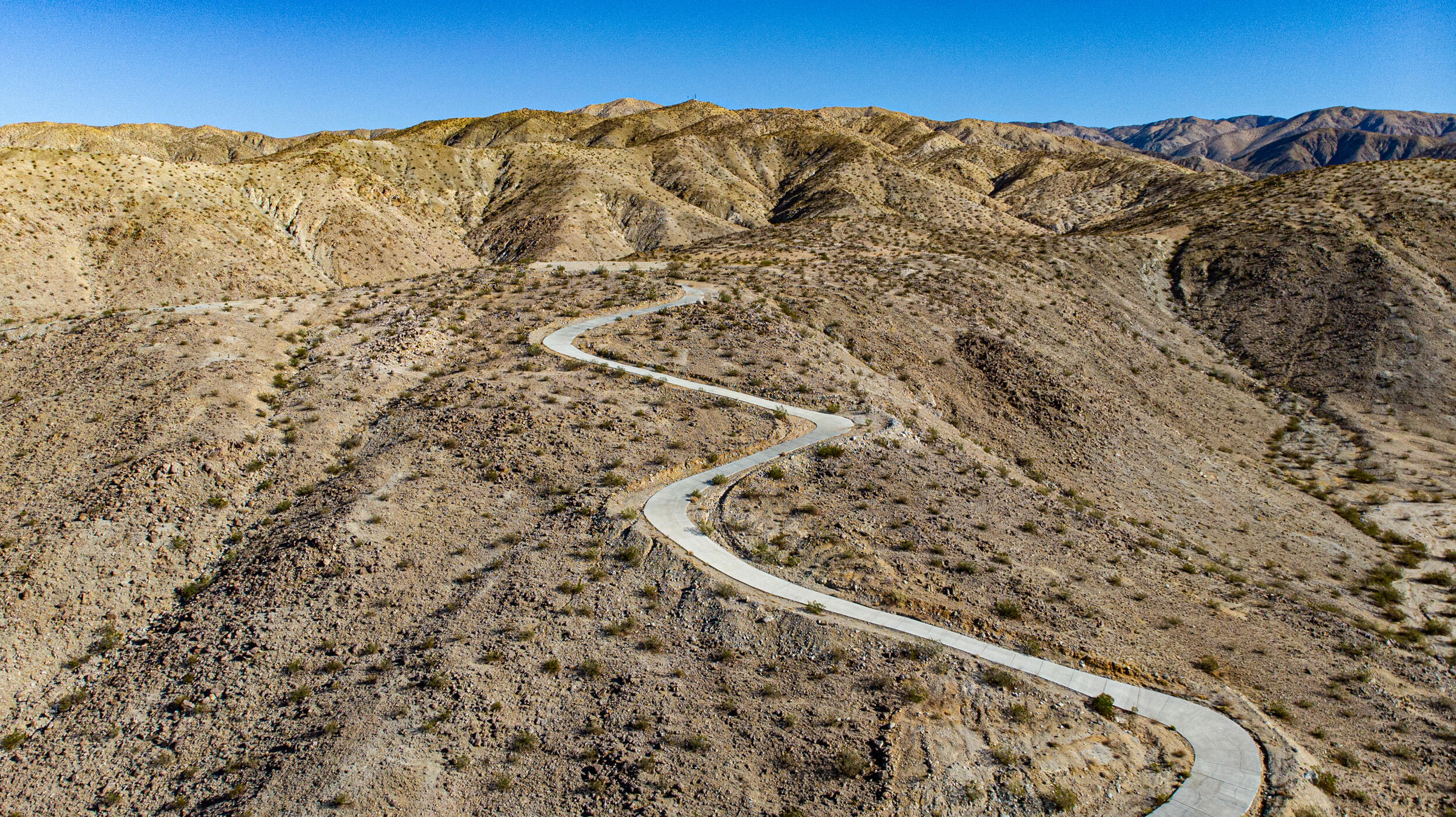 71690 Channel Run Road Desert Hot Springs, CA 92241 - Photo 4 of 18 a view of a large mountain with mountains in the background
