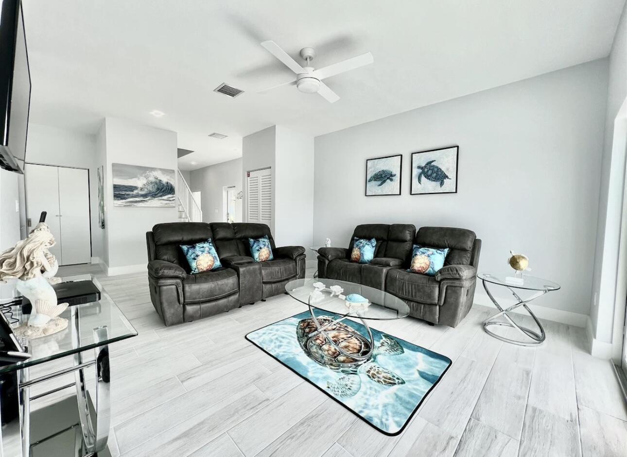 1021 82nd Street Marathon, FL 33050 - Photo 11 of 33 a living room with furniture a rug and white walls