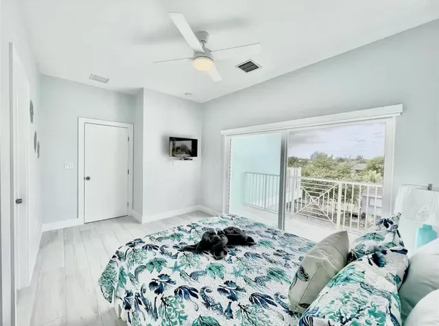 a bathroom with a sink a toilet a shower and a mirror