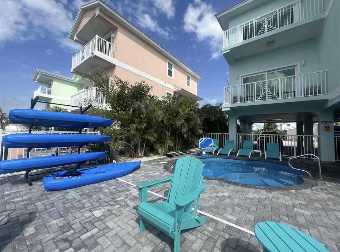 1021 82nd Street Marathon, FL 33050 - Photo 29 of 33 a view of a chairs with a table in the patio