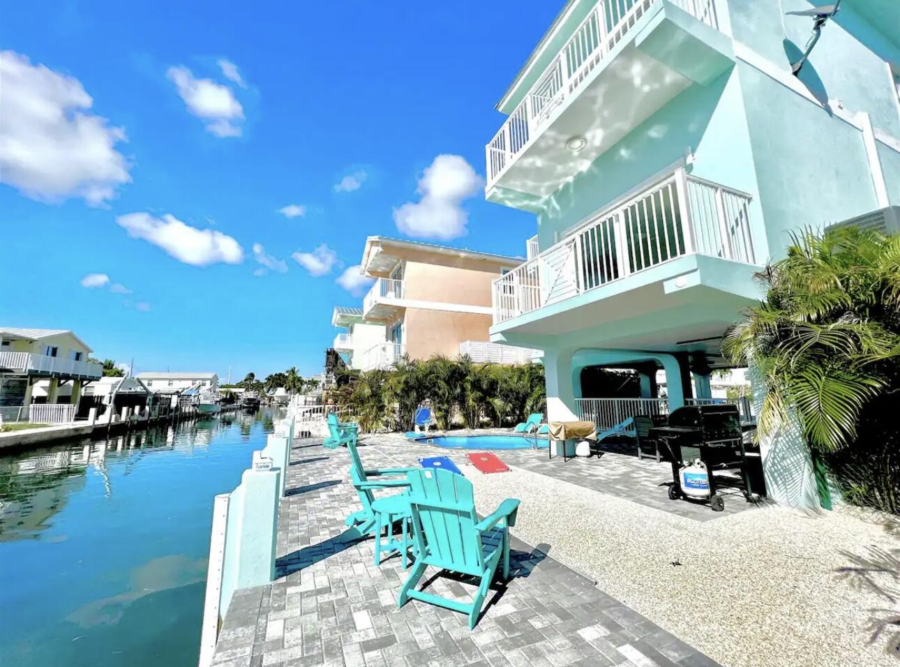 1021 82nd Street Marathon, FL 33050 - Photo 31 of 33 a view of swimming pool with outdoor seating