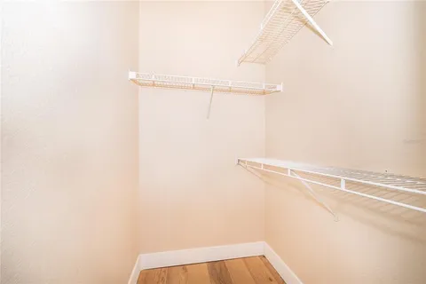 a view of a room with racks on the wall