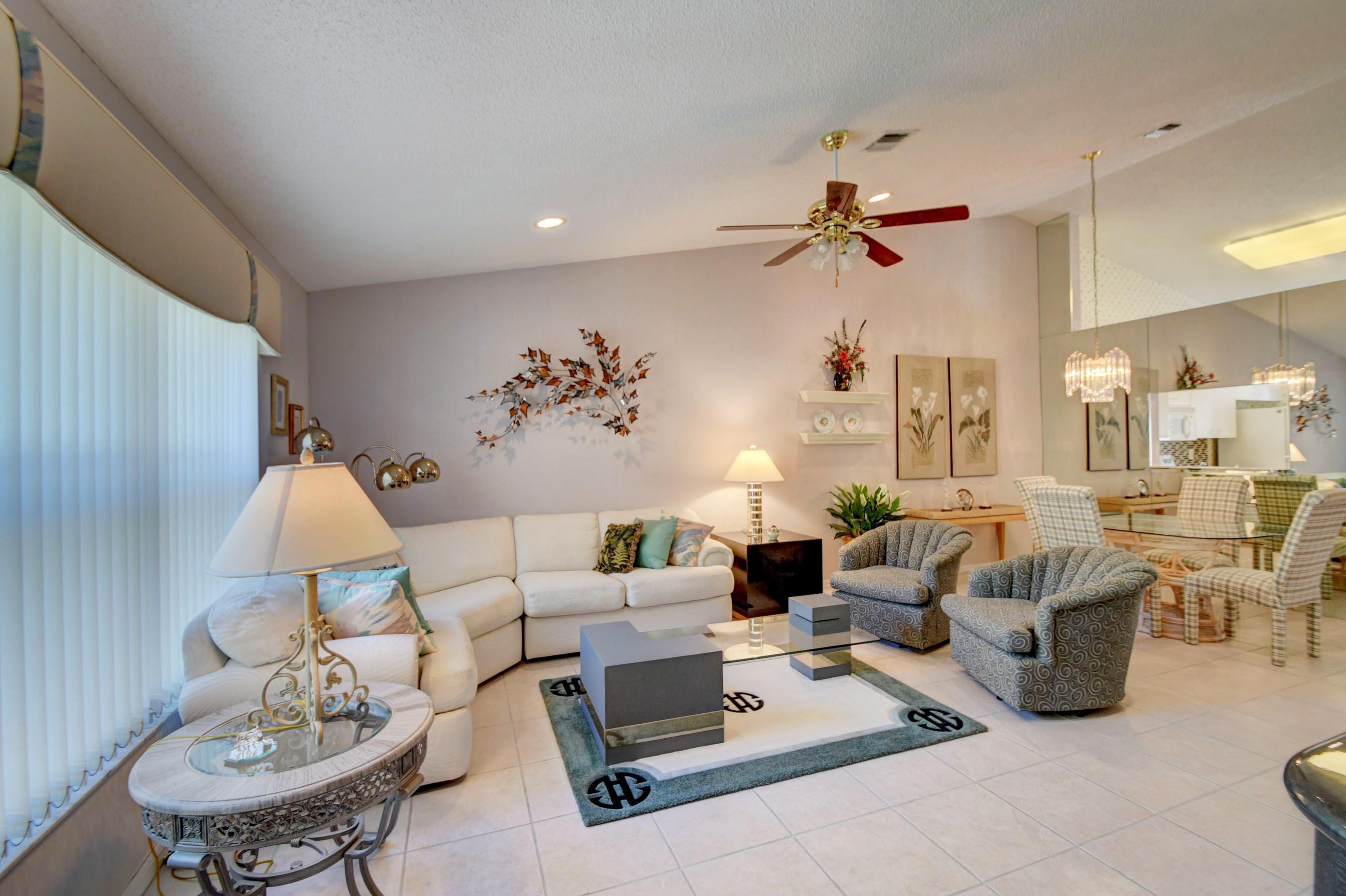 6121 Heliconia Road Delray Beach, FL 33484 - Photo 11 of 49 a living room with furniture