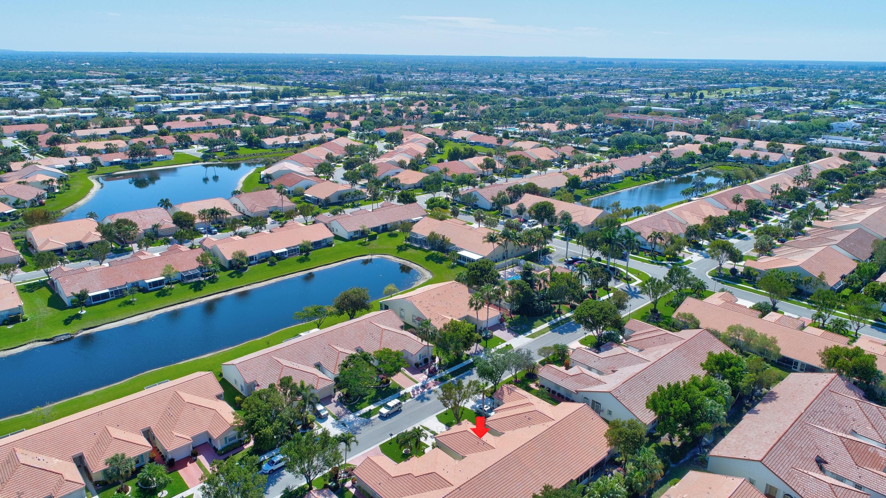6121 Heliconia Road Delray Beach, FL 33484 - Photo 32 of 49 an aerial view of a city