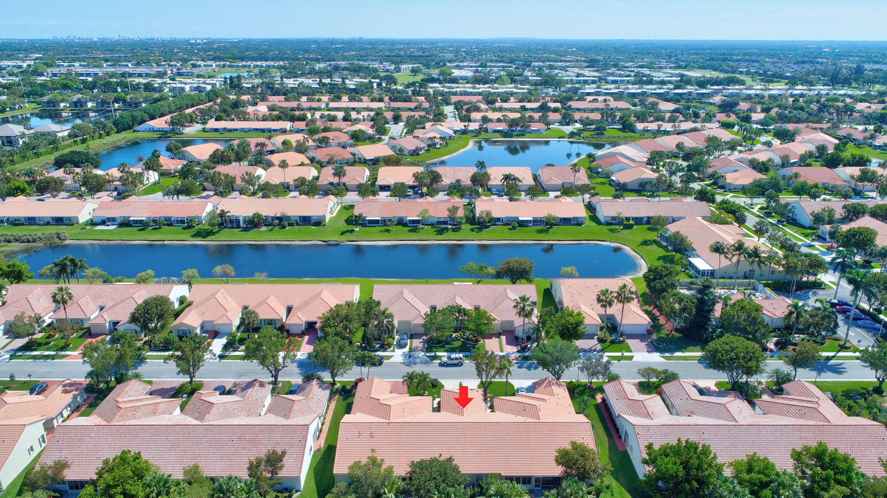 6121 Heliconia Road Delray Beach, FL 33484 - Photo 33 of 49 an aerial view of a houses with outdoor space