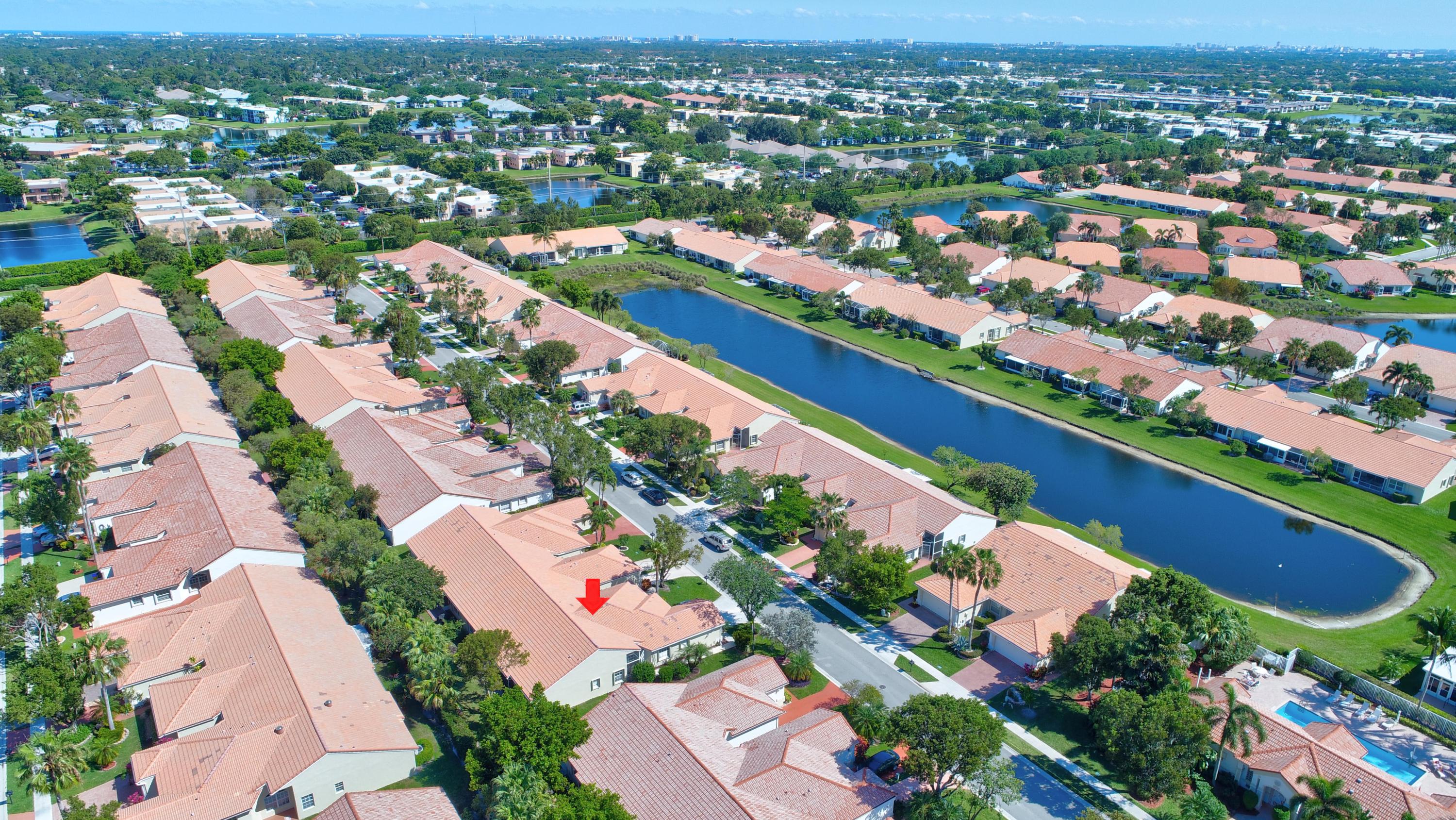 6121 Heliconia Road Delray Beach, FL 33484 - Photo 34 of 49 an aerial view of a city with lots of residential buildings