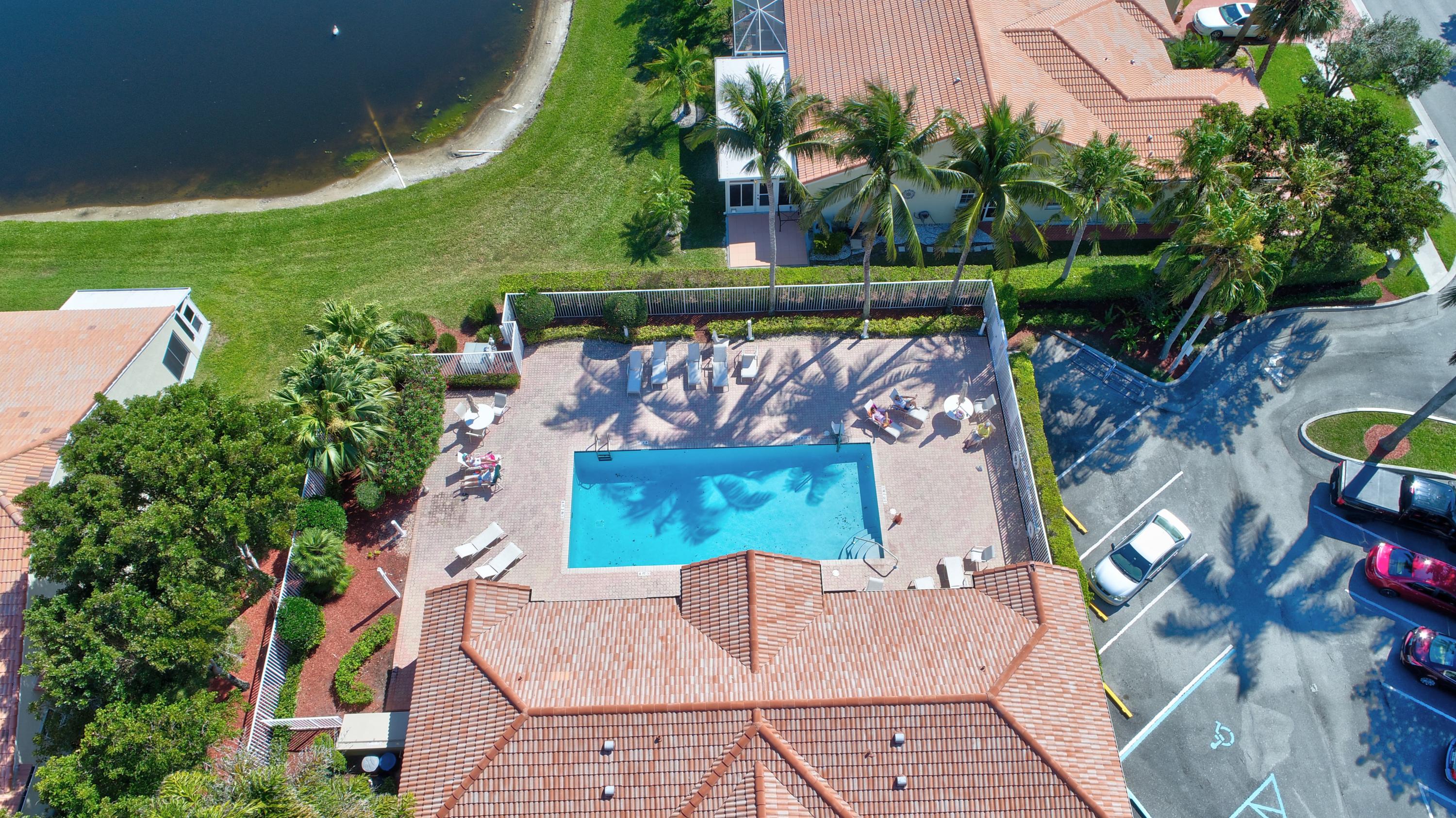 6121 Heliconia Road Delray Beach, FL 33484 - Photo 35 of 49 an outdoor view with patio