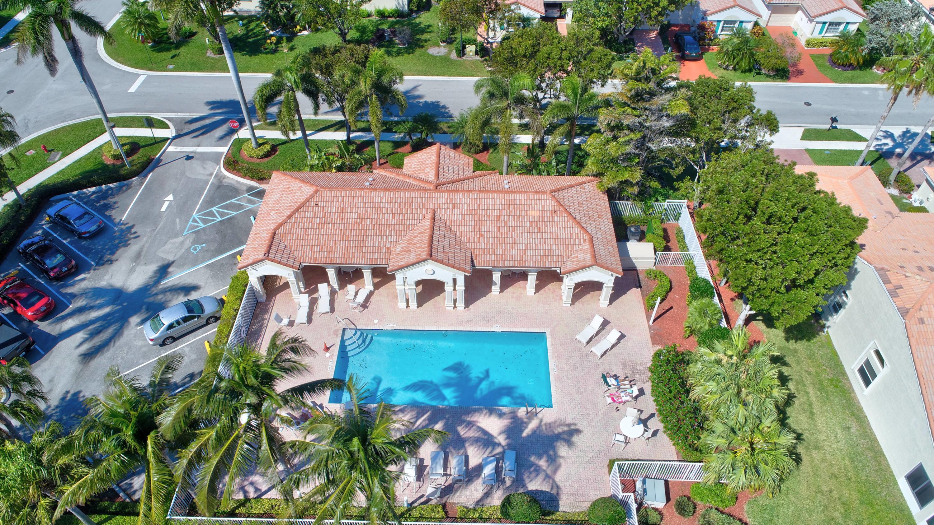 6121 Heliconia Road Delray Beach, FL 33484 - Photo 36 of 49 an aerial view of a house with a garden
