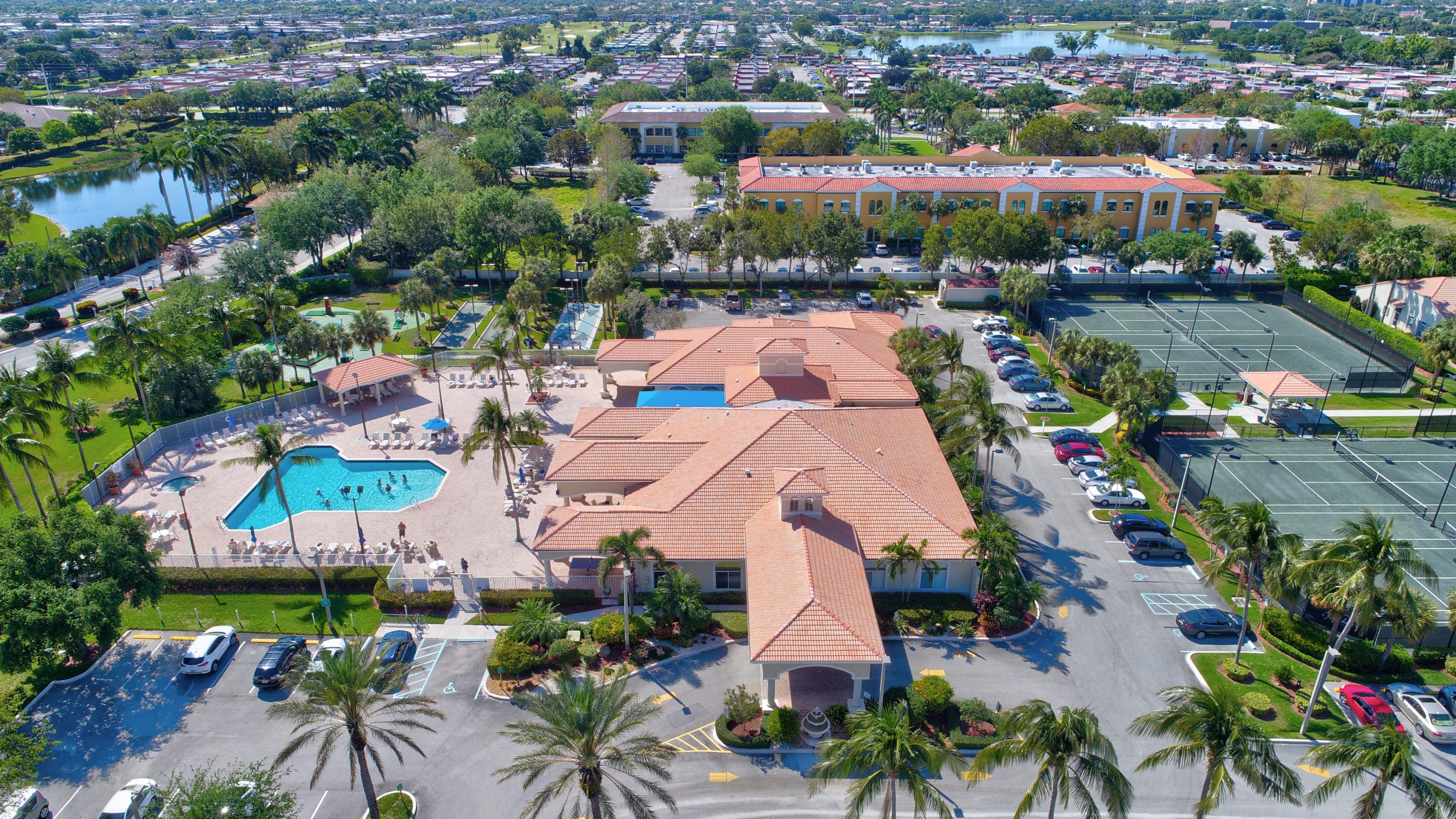6121 Heliconia Road Delray Beach, FL 33484 - Photo 38 of 49 an aerial view of residential houses with outdoor space
