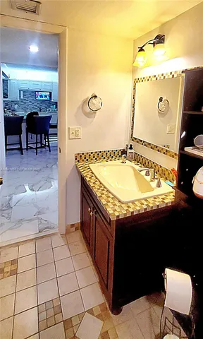 a view of a swimming pool with lounge chair