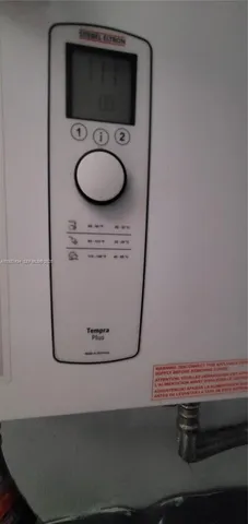 a view of a flower pot and a sink