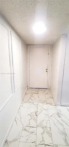 a vase of flowers sitting on a table