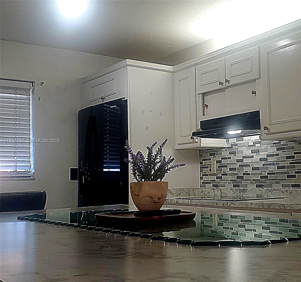 3905 North Nob Hill Road, Unit 510 Sunrise, FL 33351 - Photo 21 of 60 a view of a flower pot and a sink