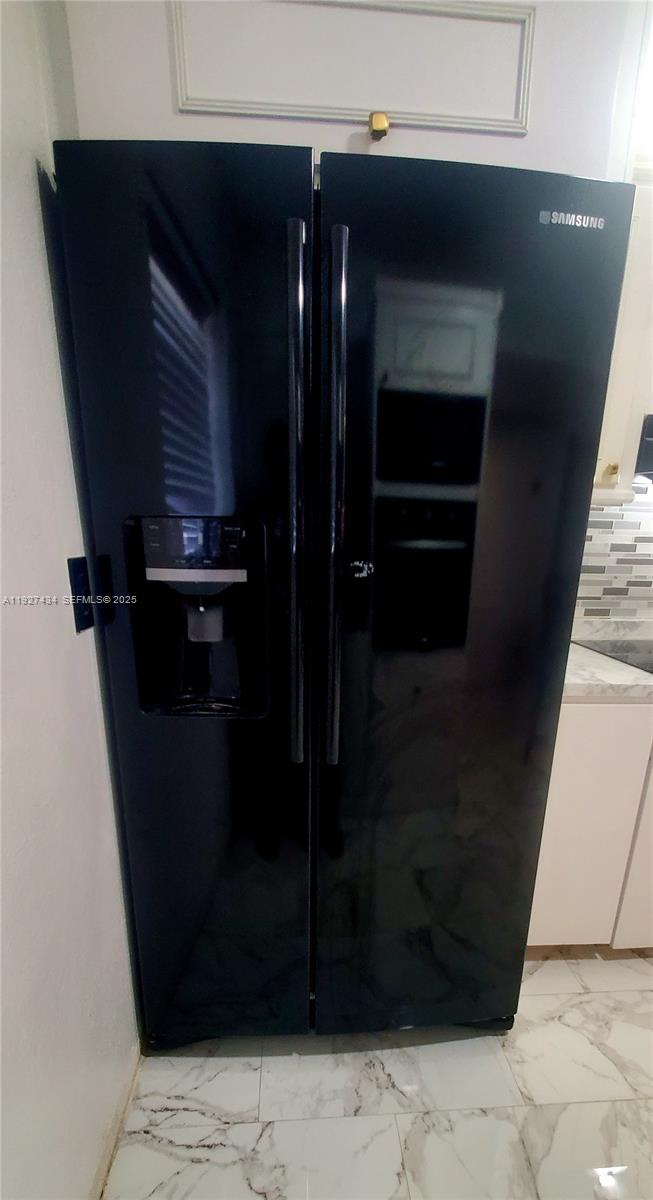 3905 North Nob Hill Road, Unit 510 Sunrise, FL 33351 - Photo 28 of 60 a close view of water heater