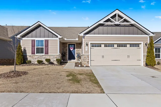 a view of front of house with garage