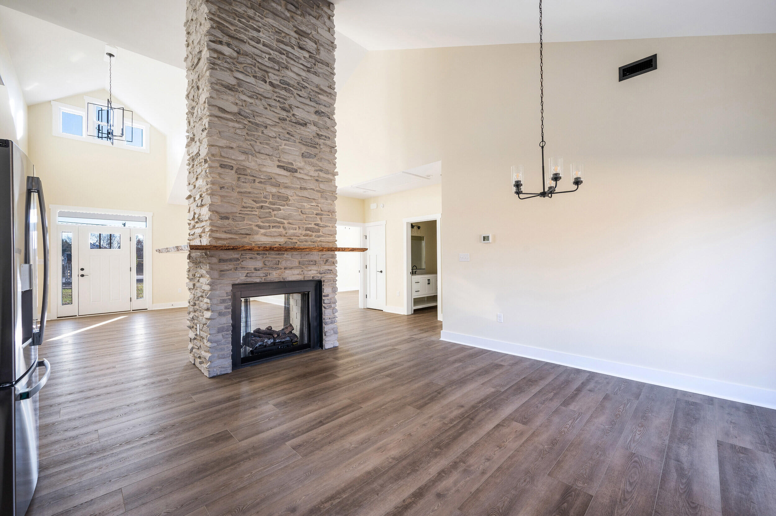 520 Raflo Place Avenue Bedford, VA 24523 - Photo 11 of 54 a view of a livingroom with wooden floor and a fireplace