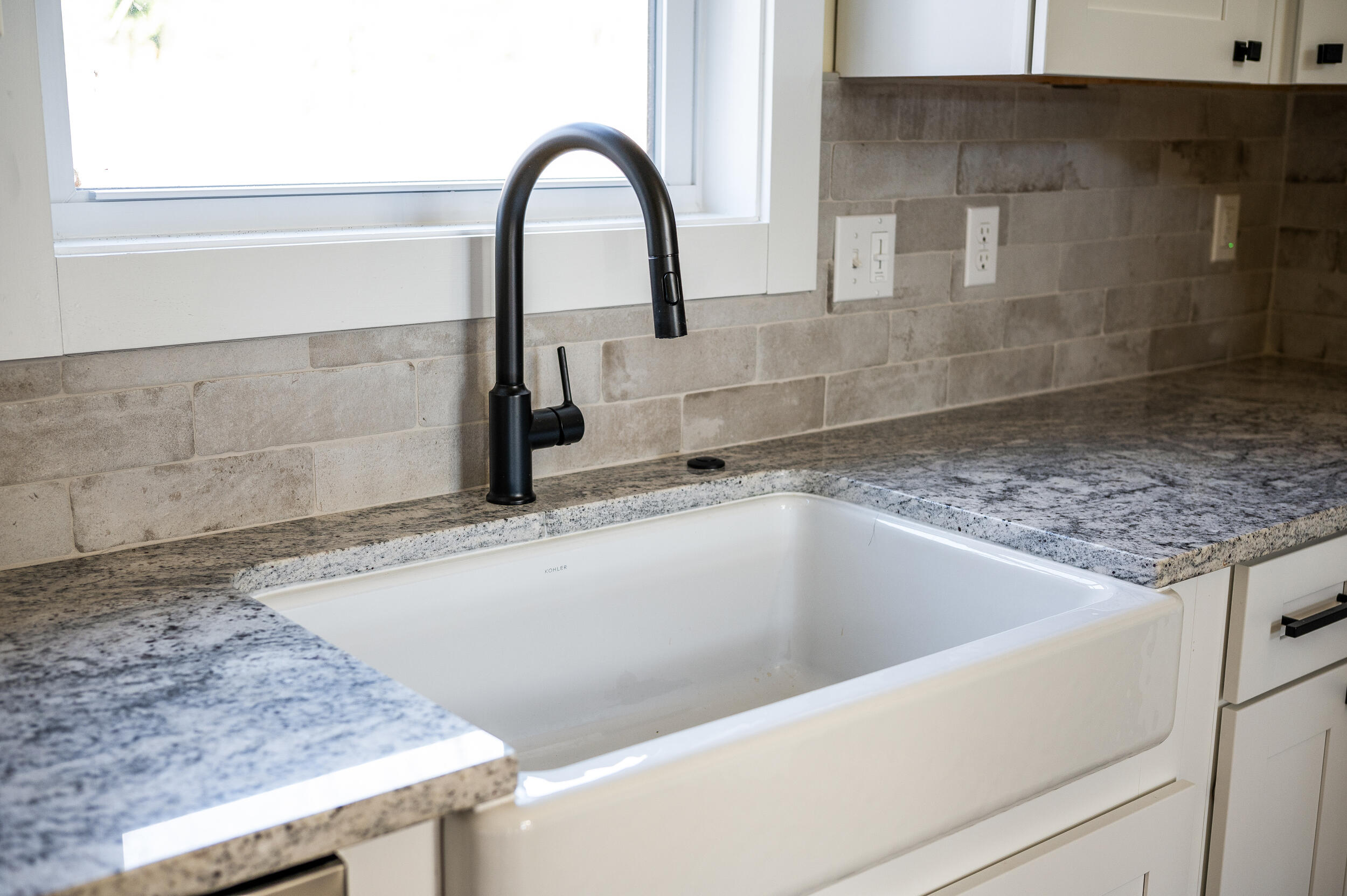 520 Raflo Place Avenue Bedford, VA 24523 - Photo 21 of 54 a close view of a sink a faucet and appliance in the kitchen