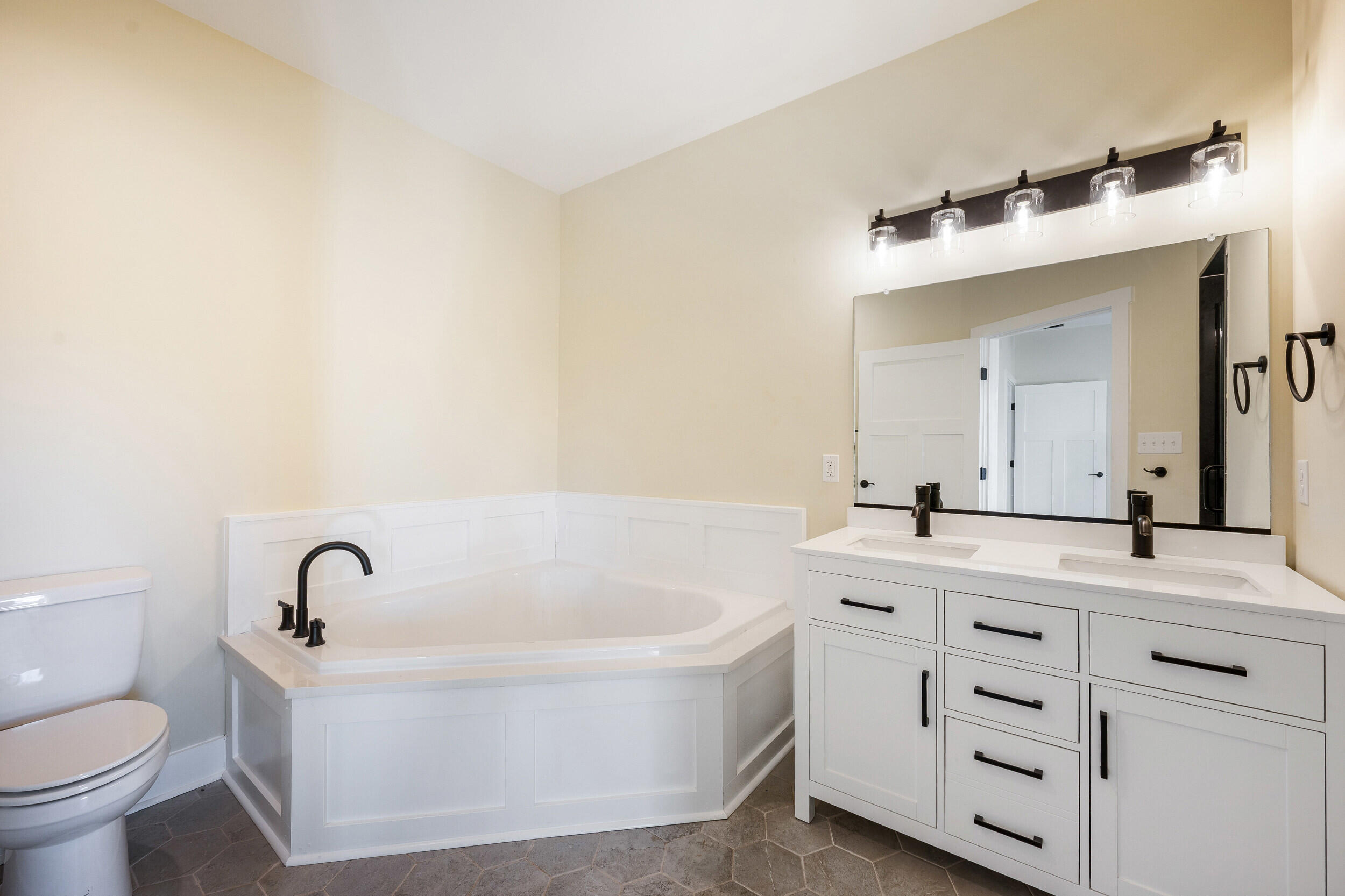 520 Raflo Place Avenue Bedford, VA 24523 - Photo 28 of 54 a bathroom with a bathtub sink mirror and toilet