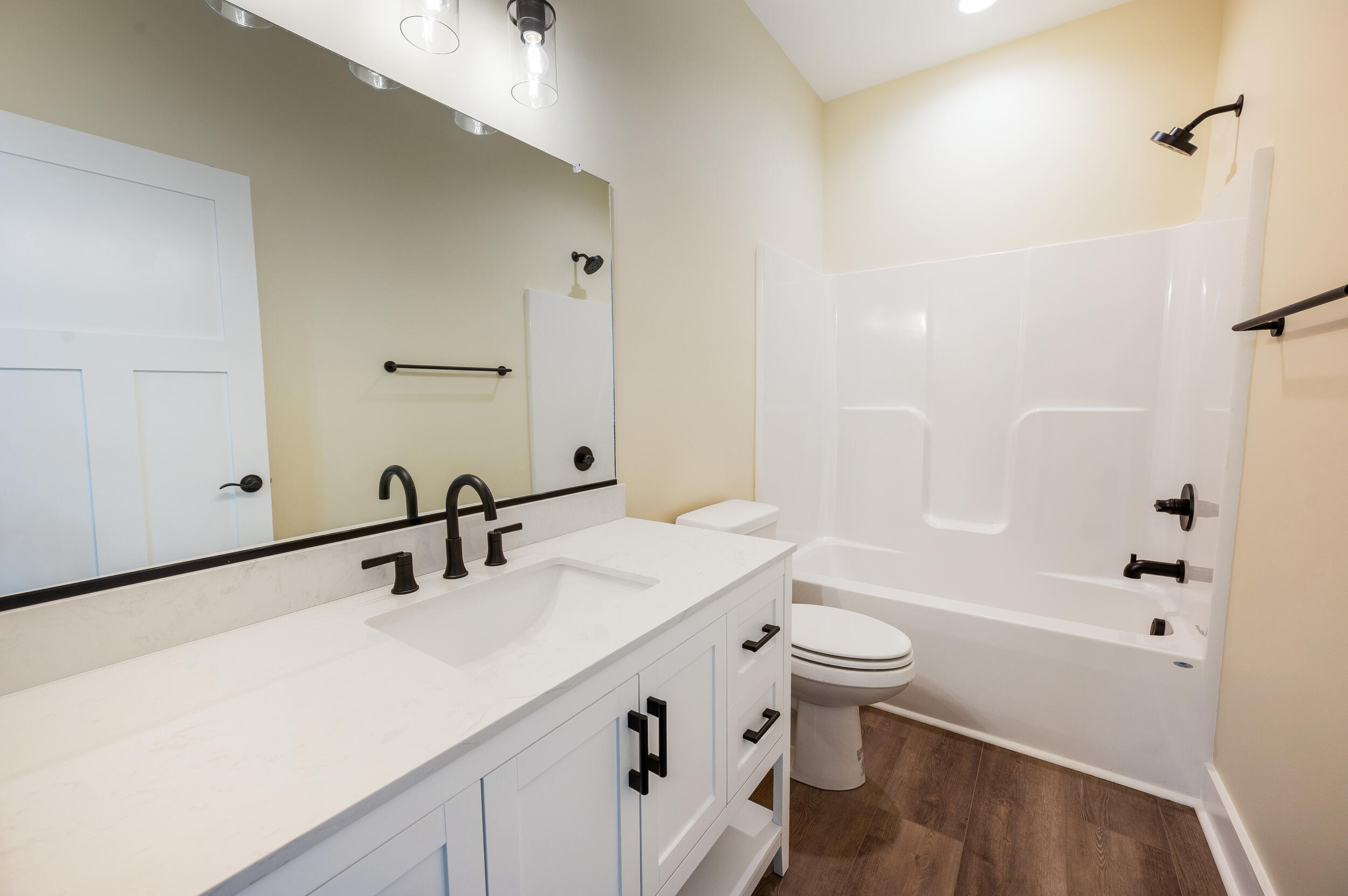 520 Raflo Place Avenue Bedford, VA 24523 - Photo 42 of 54 a bathroom with a sink a toilet a mirror and shower