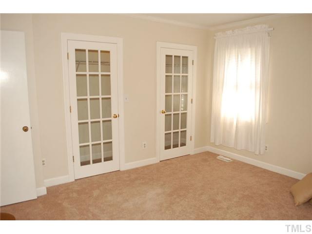 110 Georgetown Road Raleigh, NC 27608 - Photo 15 of 16 an empty room with windows