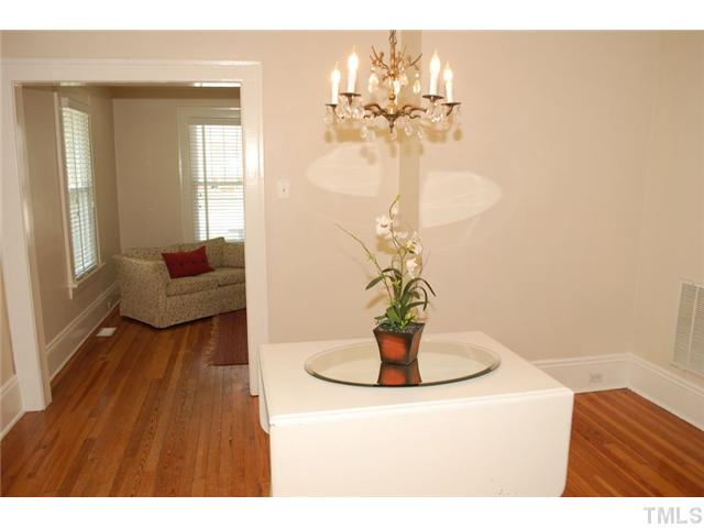 110 Georgetown Road Raleigh, NC 27608 - Photo 5 of 16 a vase of flowers sitting on a table