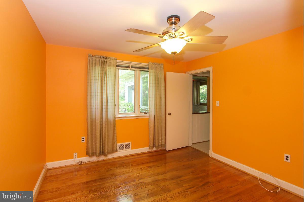 1304 Chalmers Road Silver Spring, MD 20903 - Photo 12 of 19 a view of a room with a chandelier