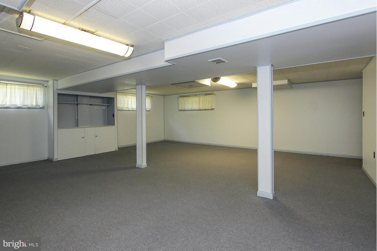 1304 Chalmers Road Silver Spring, MD 20903 - Photo 14 of 19 an empty room with a empty space