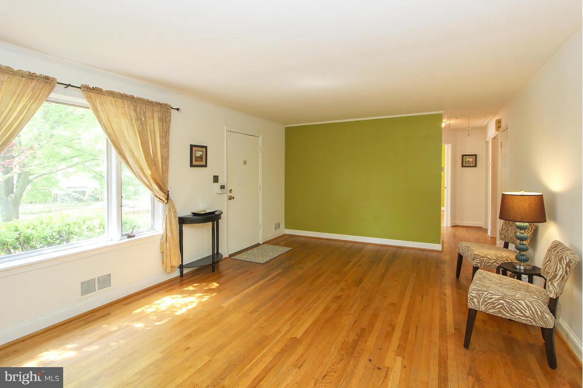 1304 Chalmers Road Silver Spring, MD 20903 - Photo 5 of 19 a view of an empty room with a window