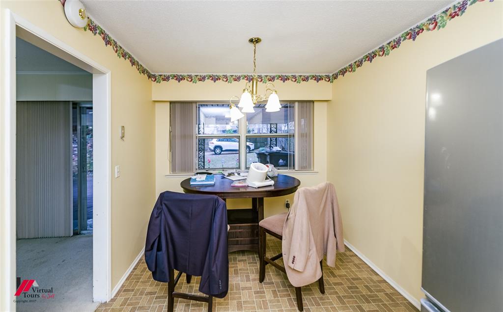 1404 North Acres Circle Springhill, LA 71075 - Photo 14 of 29 Dining area with suspended lighting and baseboards