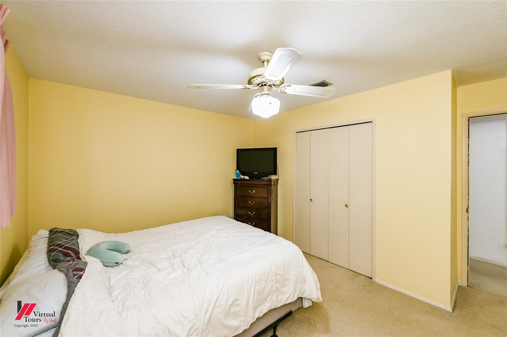 1404 North Acres Circle Springhill, LA 71075 - Photo 26 of 29 Carpeted bedroom featuring a ceiling fan and a closet