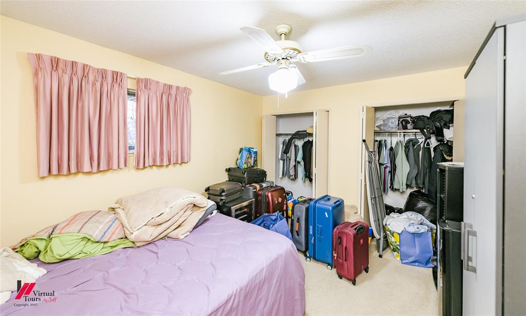 1404 North Acres Circle Springhill, LA 71075 - Photo 29 of 29 Carpeted bedroom featuring two closets and ceiling fan