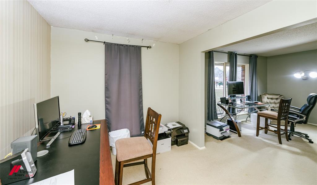 1404 North Acres Circle Springhill, LA 71075 - Photo 10 of 29 Office area with a textured ceiling, light colored carpet, and wallpapered walls