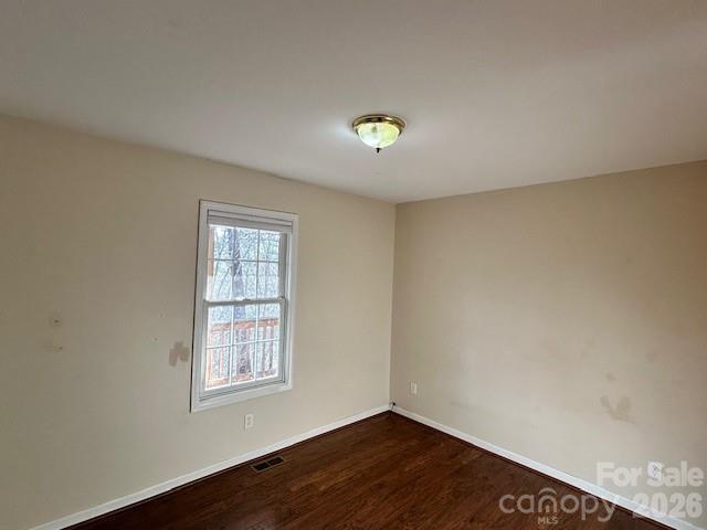 45 Marshbanks Ridge Weaverville, NC 28787 - Photo 17 of 36 an empty room with wooden floor and windows