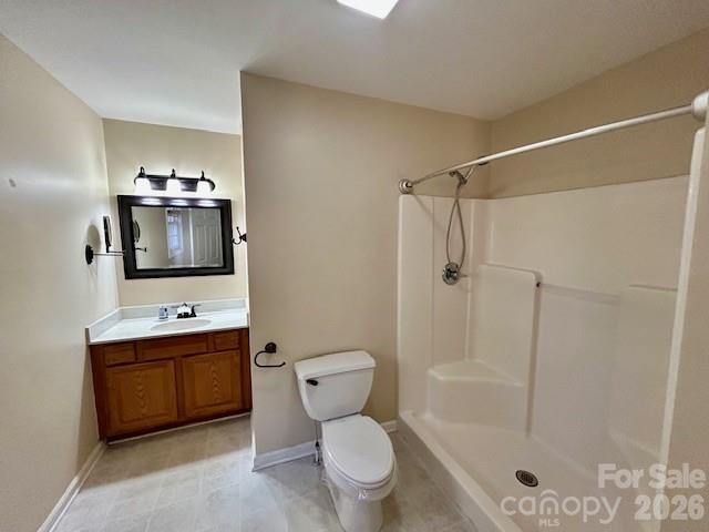 45 Marshbanks Ridge Weaverville, NC 28787 - Photo 22 of 36 a bathroom with a toilet sink shower and mirror