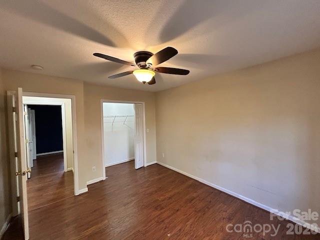 45 Marshbanks Ridge Weaverville, NC 28787 - Photo 24 of 36 an empty room with wooden floor and a ceiling fan