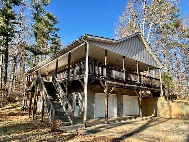 45 Marshbanks Ridge Weaverville, NC 28787 - Photo 3 of 36 a view of a house with large trees